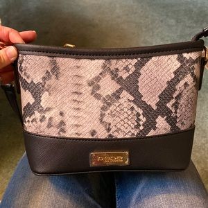 Bebe snake skin purse. Never used.